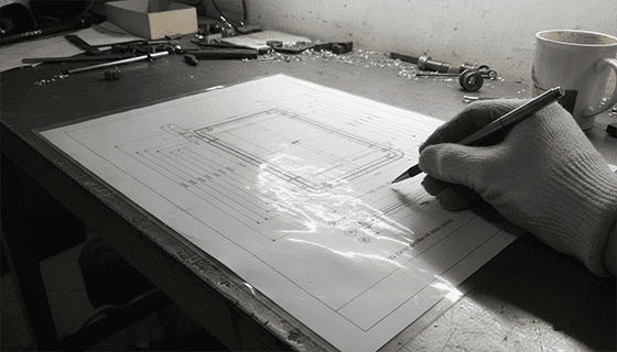 An example of a technical drawing for a cabinet handle with dimensions and material callouts.