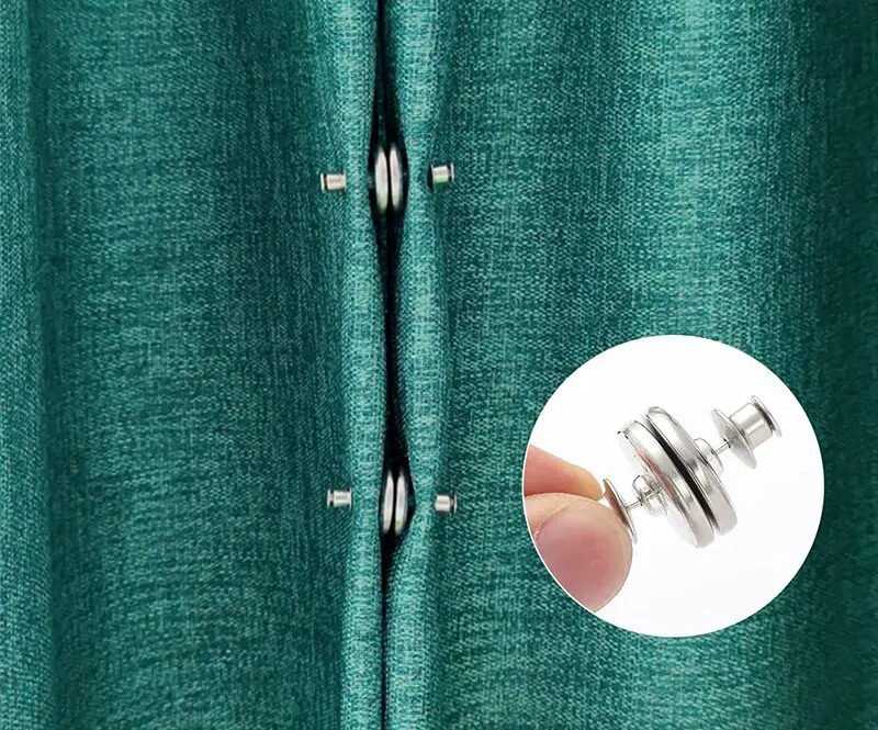 A frustrating sliver of bright light leaking between two dark blackout curtain panels in a bedroom.